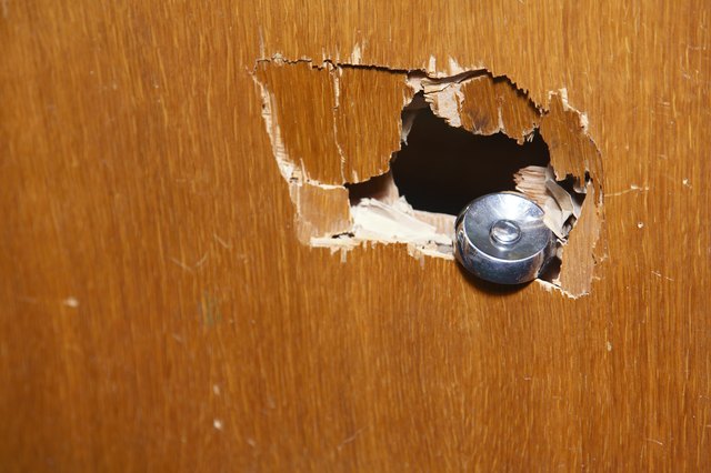 How To Fix A Hole In A Door An Easy DIY Guide Hunker