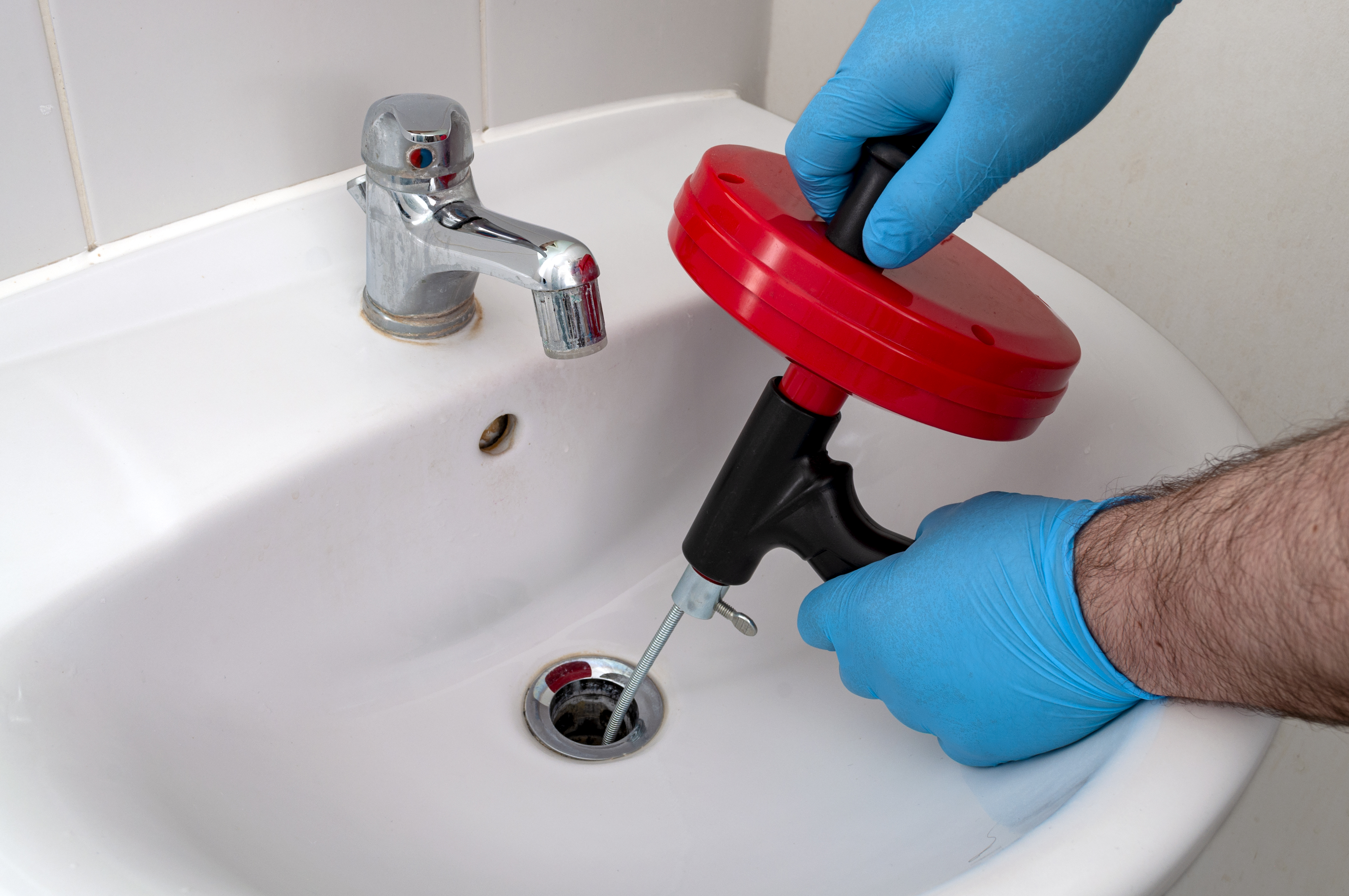 How To Unclog A Toilet With An Auger - DIY Plumbing - The Expert Plumber 