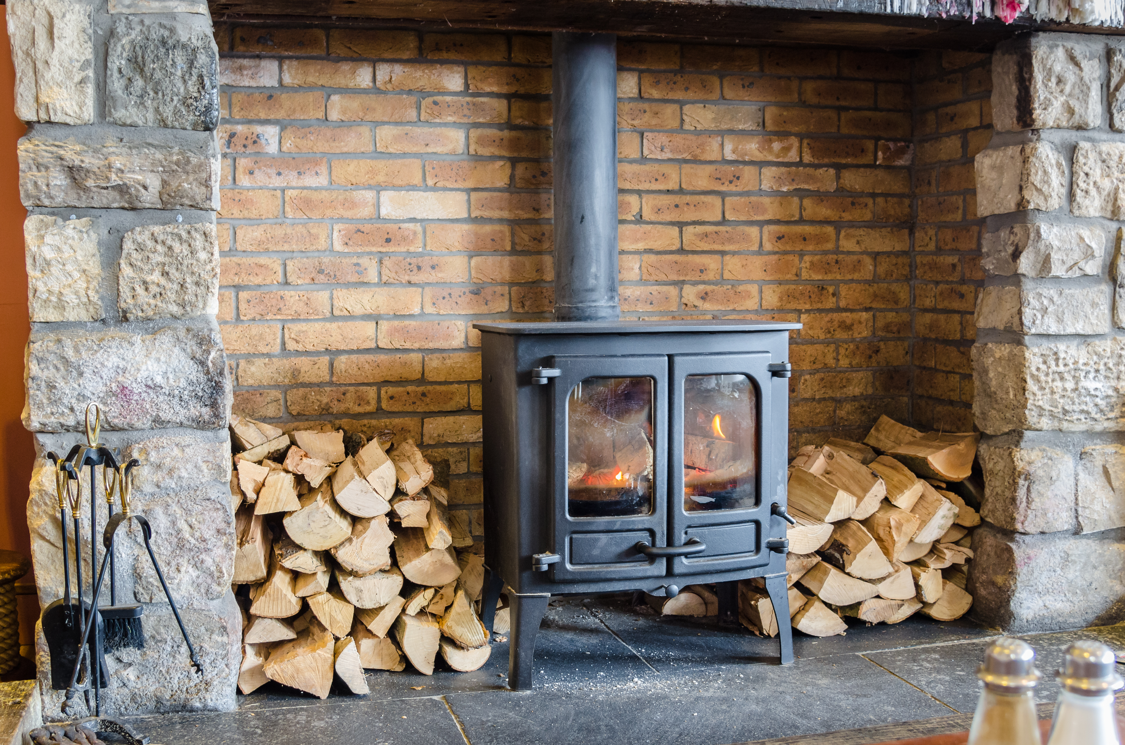 Changing out the fire brick in my country hearth wood stove. 