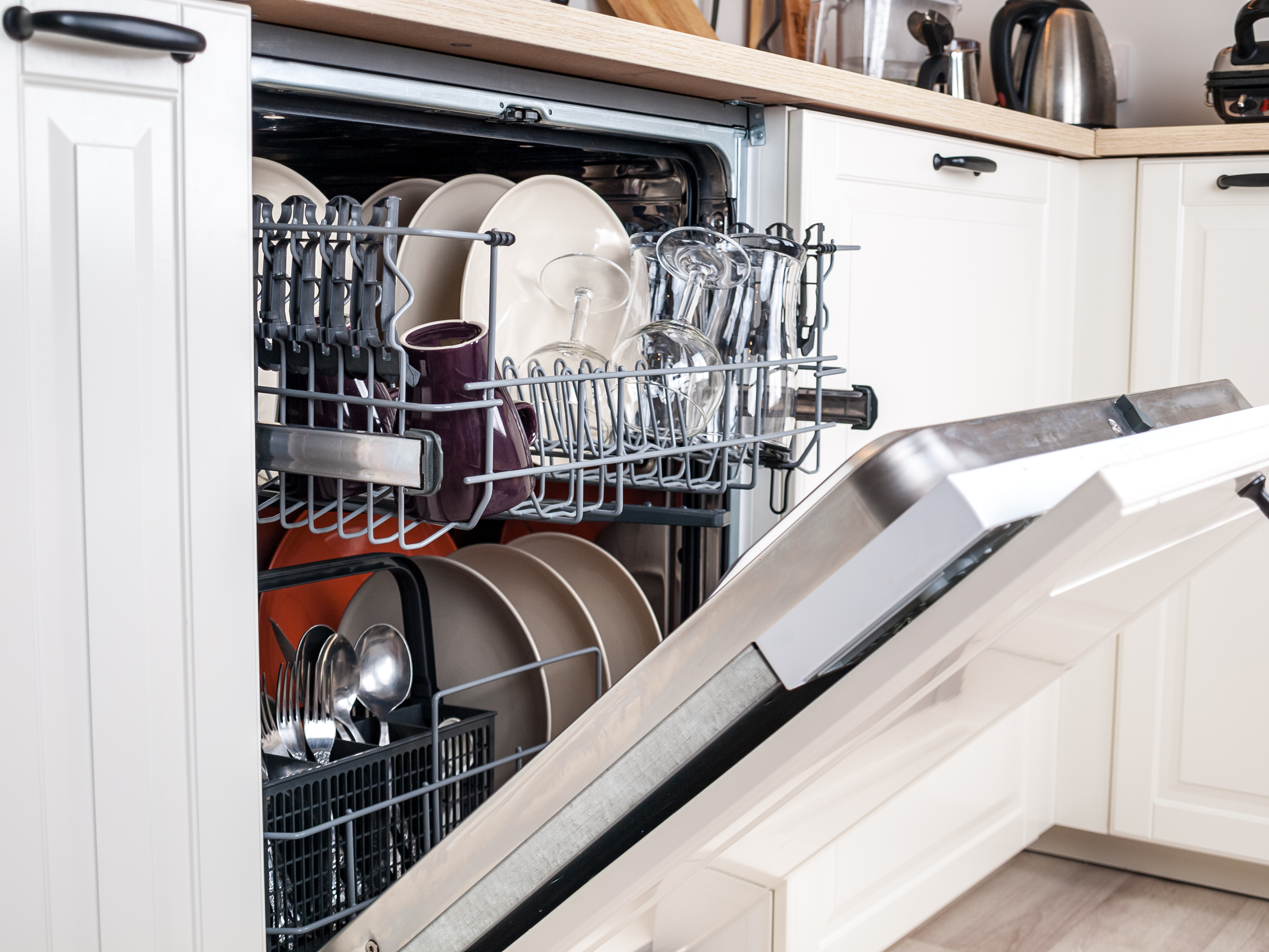 How to Put the Top Rack of a Dishwasher Back on Track