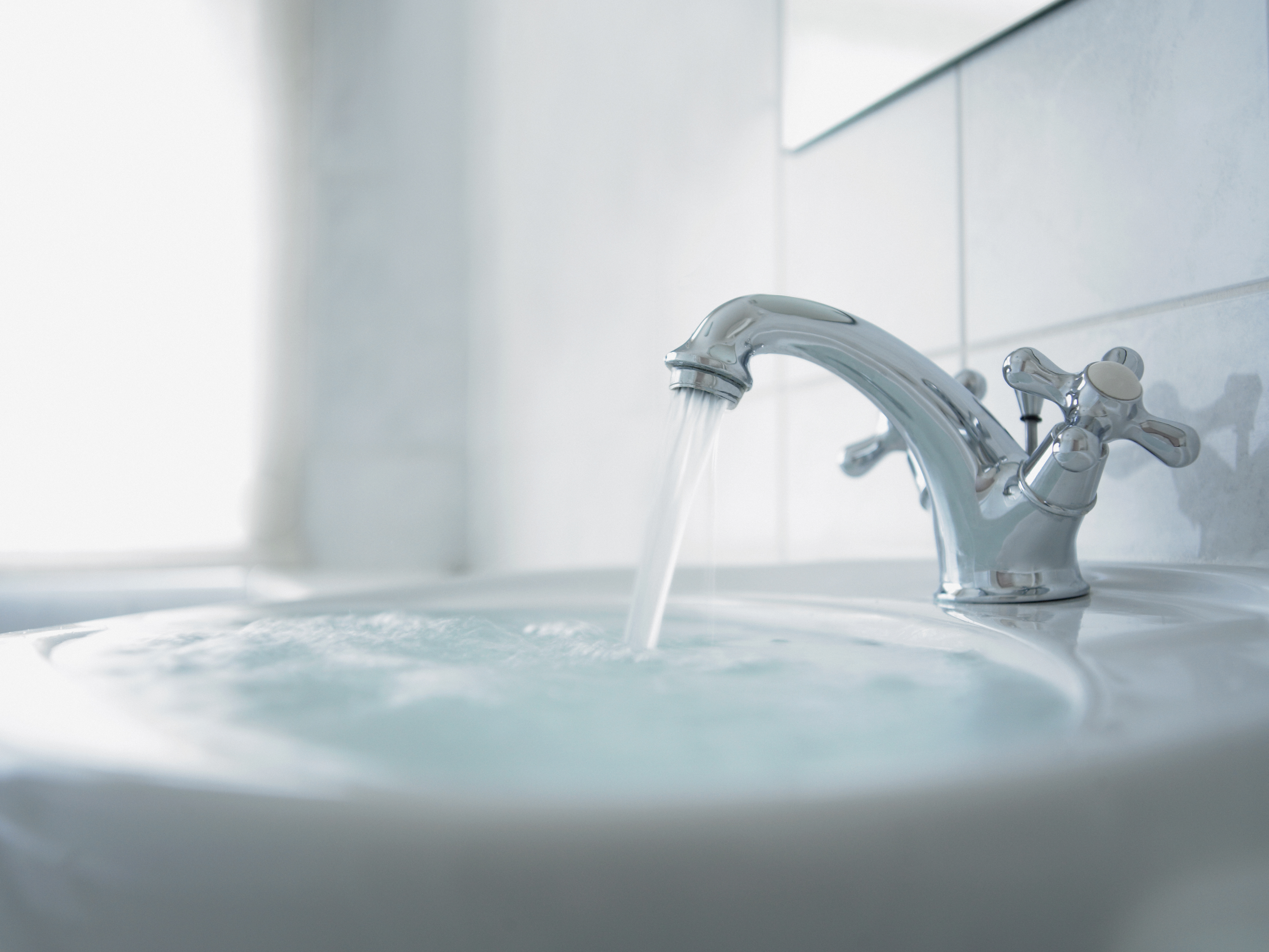 Clogged bathroom sink with clearance sitting water