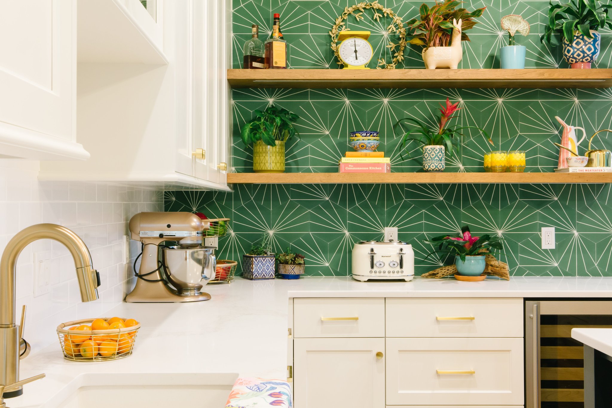 green backsplash white kitchen