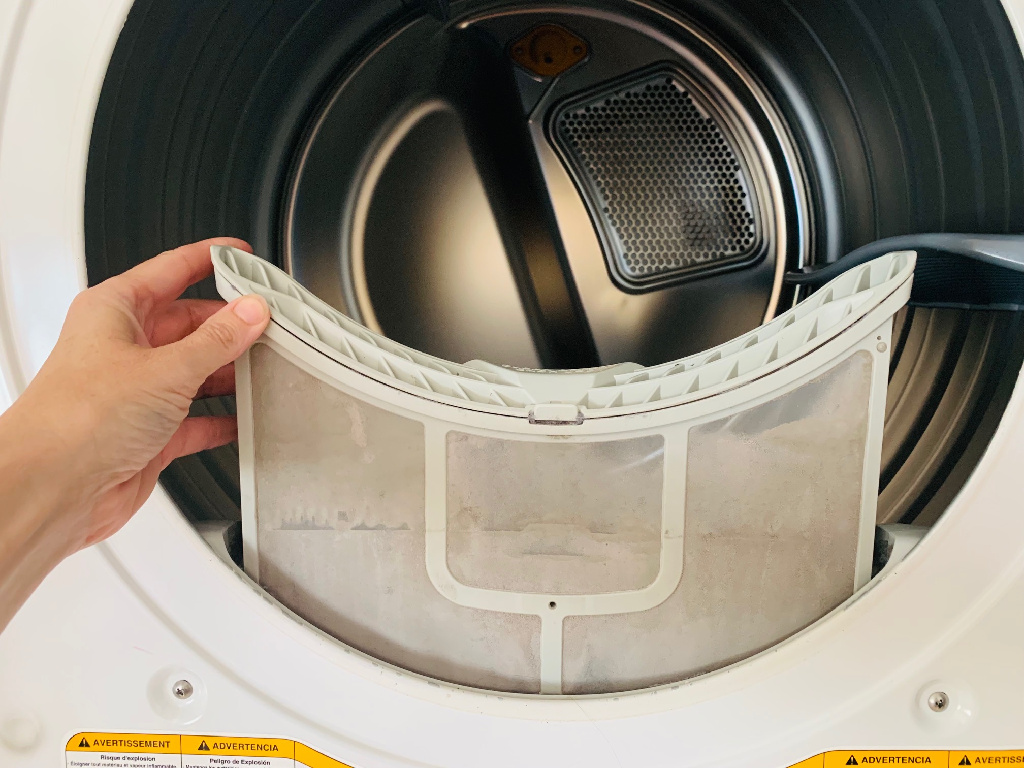 How To Clean The Dryer Lint Trap - Frugally Blonde