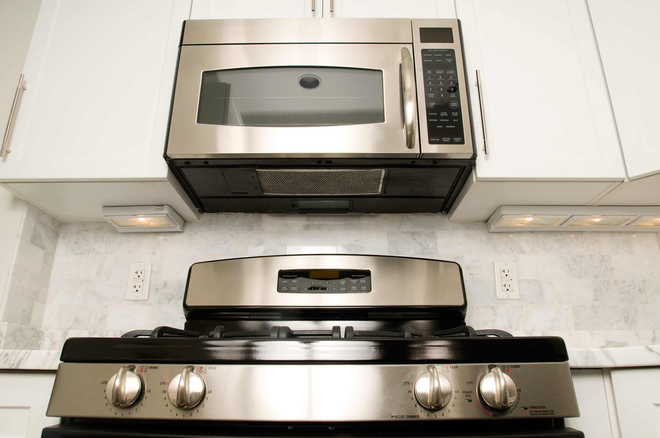 Should I purchase a vent hood or microwave vent hood?