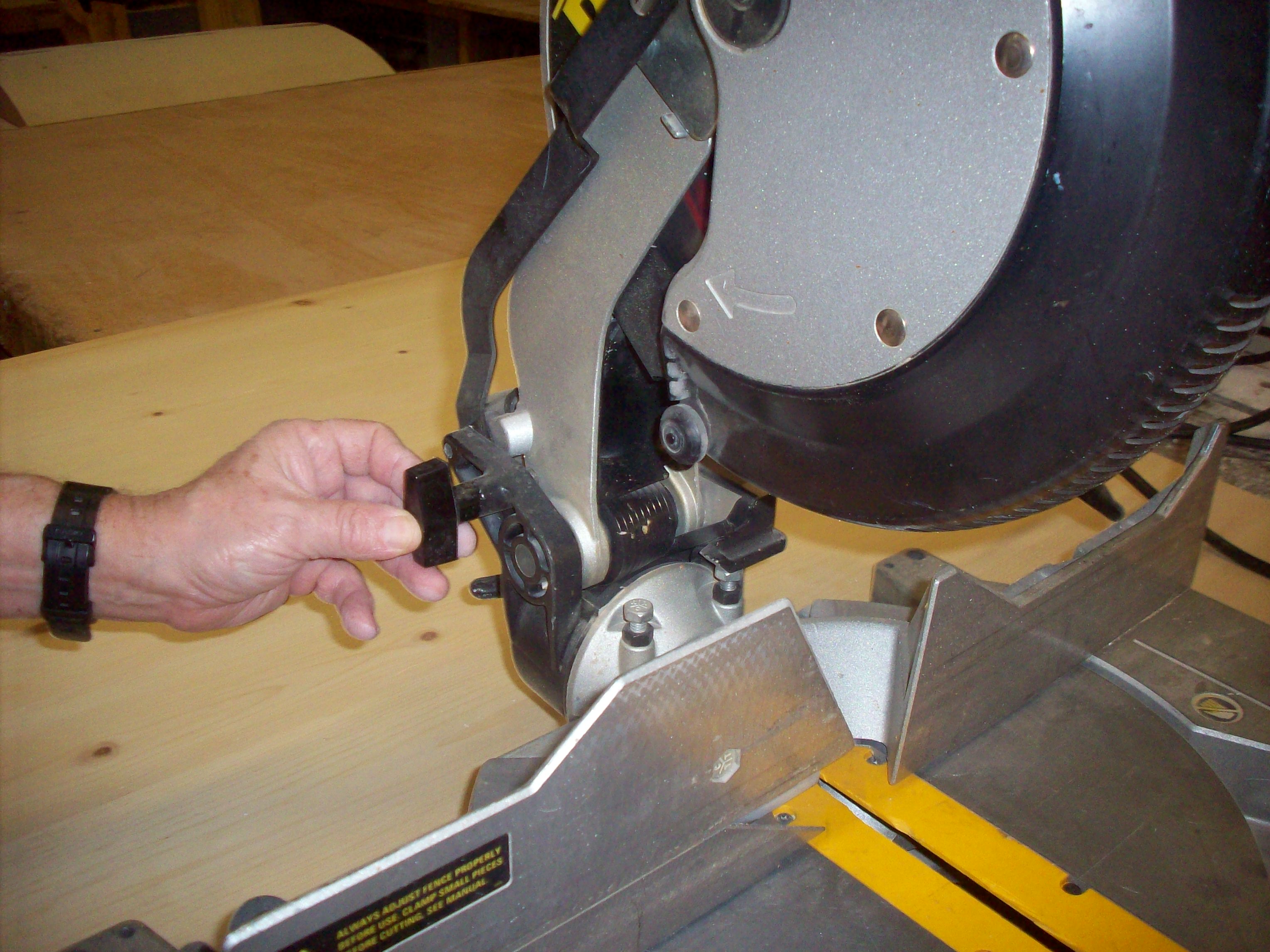 Help on how to unlock old miter saw : r/Tools