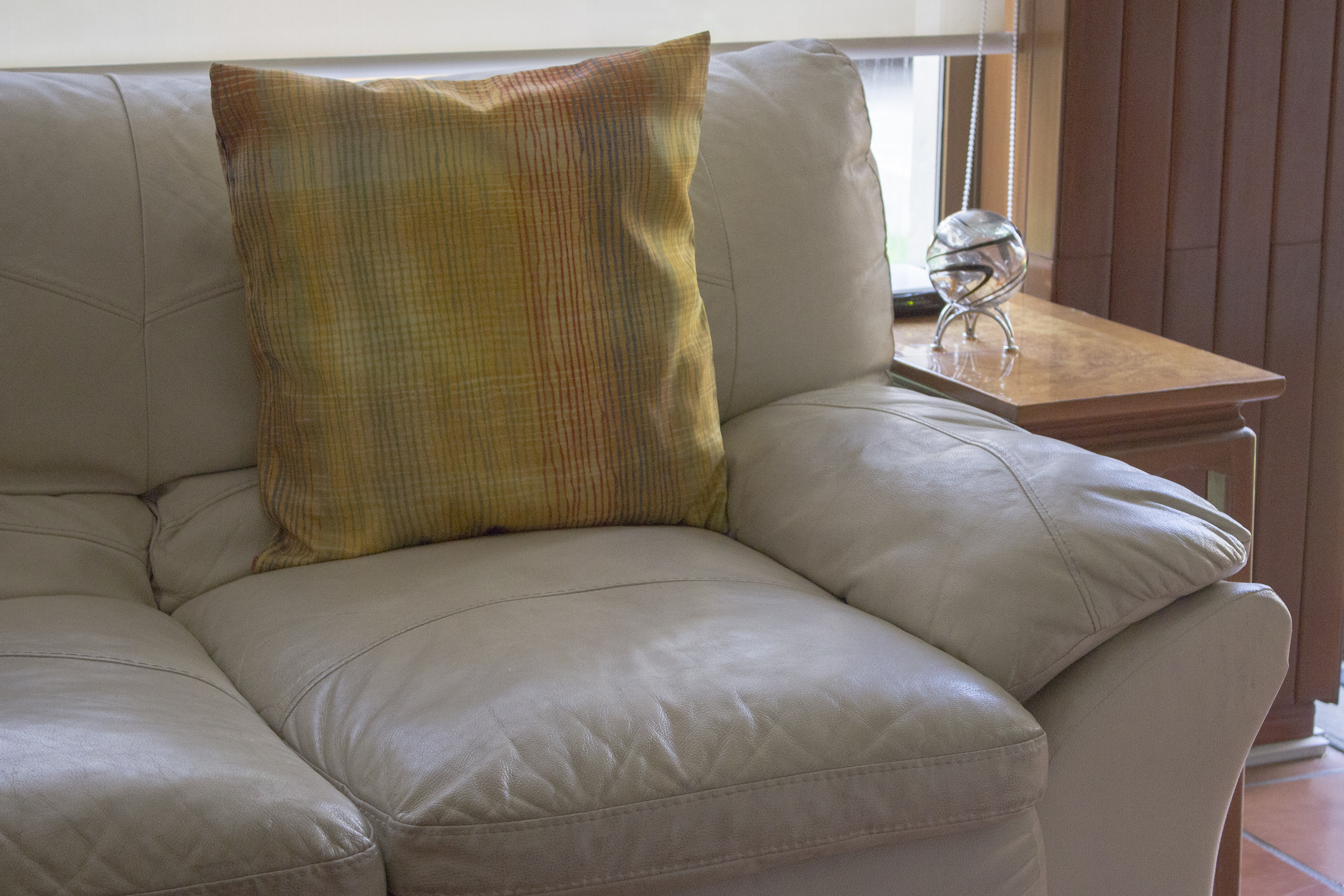 How to keep the sofa seat cushions from sliding off.