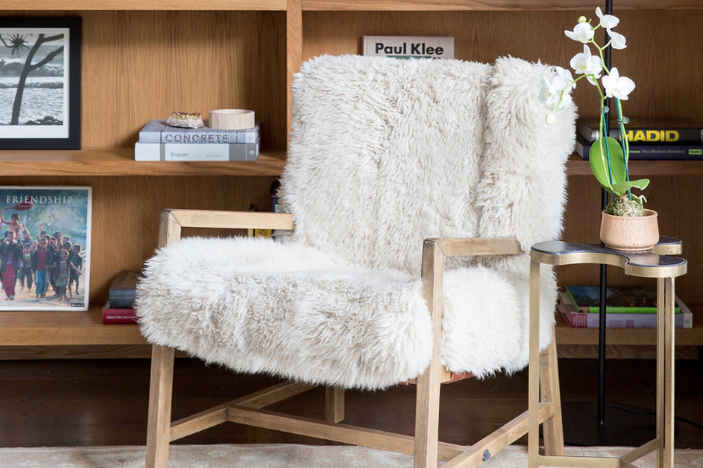 “We knew we needed to bring in something with age to it in order to reconcile the mantel with the room, knowing that we were keeping the rest of the room modern and spare,” she says.
