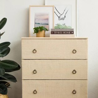 Bedroom dresser with Society6 artwork on top