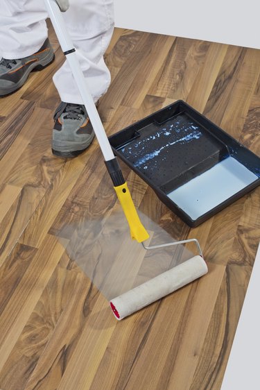 painting with primer wooden floor for waterproofing