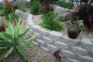 Concrete block retaining wall.