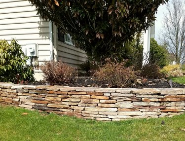 Stone retaining wall.