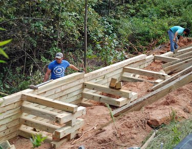 wood retaining wall under construction