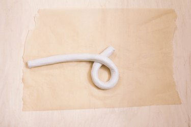 Shaping air dry clay into a knot shape