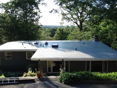 TPO roofing on single-family home.