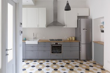 Scandinavian kitchen floor tile with hexagonal tile in yellow, white and black