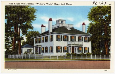 vintage photo of an old house with a widow's walk in Cape Cod, Massachusetts