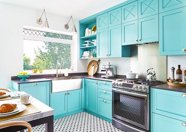 black and white kitchen floor tiles in turquoise kitchen