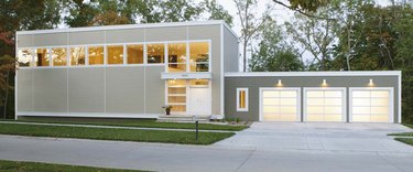 Three full-view garage doors.