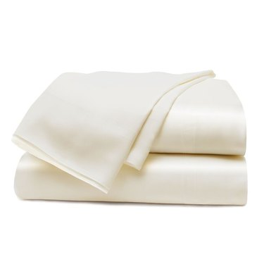 two bed sheets in off white color
