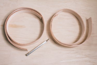 Two leather strips cut with a utility knife