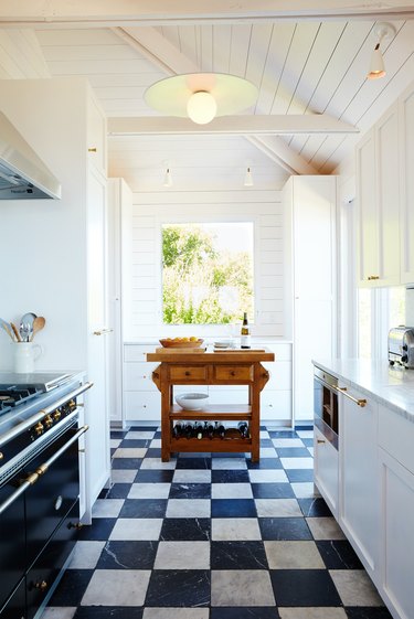 Black & white kitchen  Checkered kitchen decor, Black kitchen