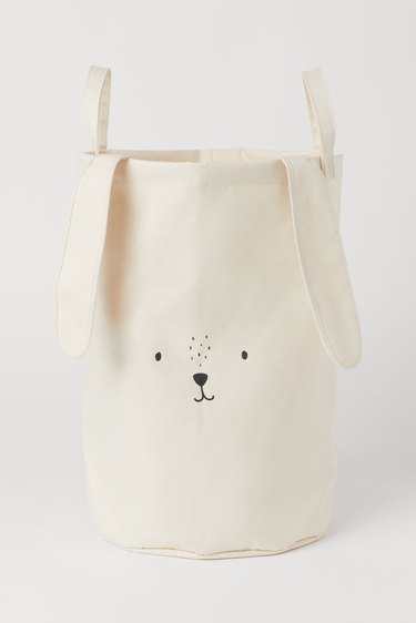 canvas storage basket with handles, bunny face. and bunny ears