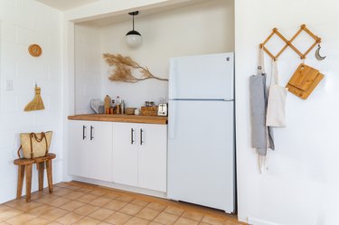 natural tone tile floor in kitchenette