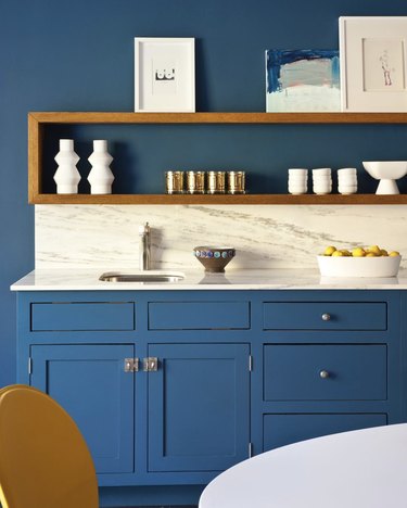 blue walls and kitchen cabinets