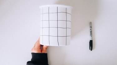 Drawn grid on jar