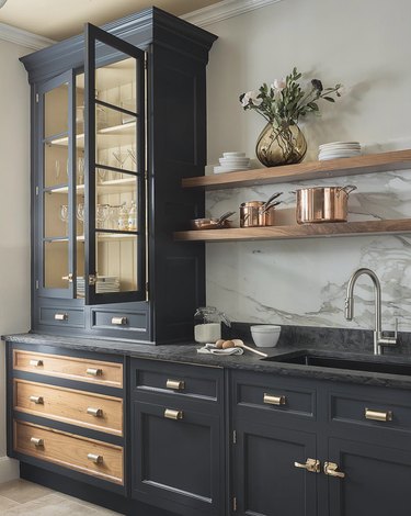 dark navy cabinets with natural wood accents