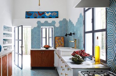 contemporary space with blue kitchen floor tile and backsplash tile