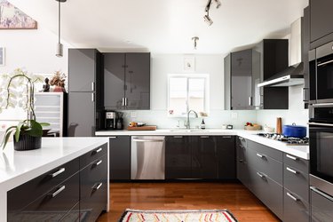 kitchen with gray cabinets and cherry wood floors