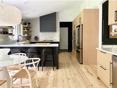 mojdern kitchen with black island