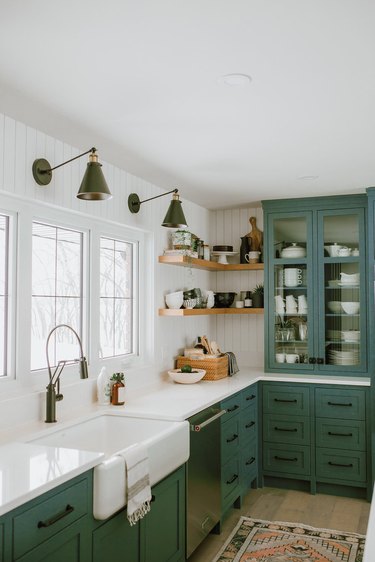farmhouse kitchen with green cabinets