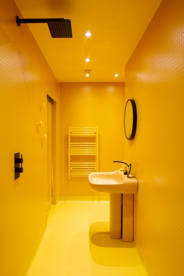 all over bright-yellow wet room in Margate, Unite Kingdom