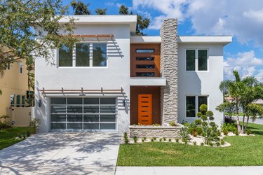 house as seen from exterior with patch of green grass