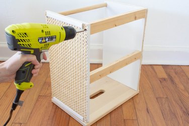 Drilling screw into wood board