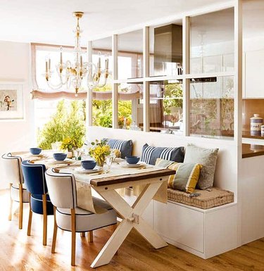 kitchen island with bench seating in coastal chic barcelona apartment