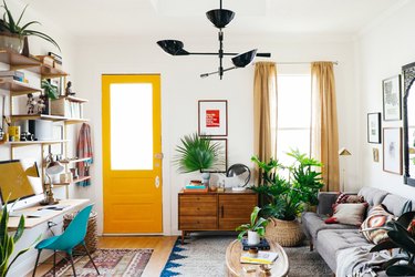 living room with yellow front door