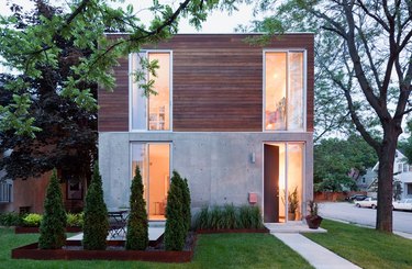 house as seen from exterior with trees and grass