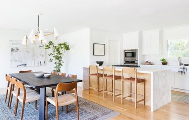 Kitchen island with stove and marble countertop