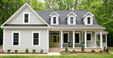 farmhouse style exterior with white rails