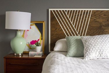 Wood and white headboard in bedroom.
