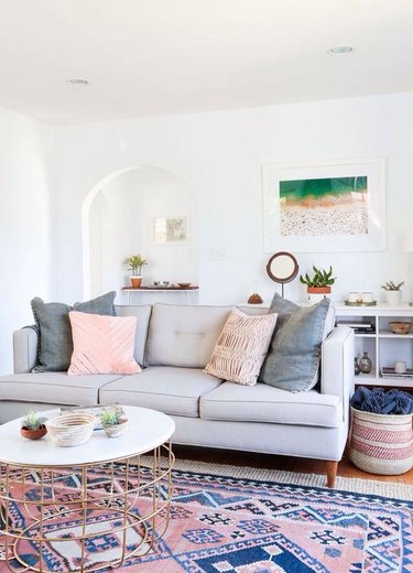 living room with pink accents