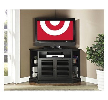 Black corner TV unit with open shelving on each side