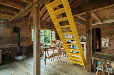cabin interior with yellow ladder