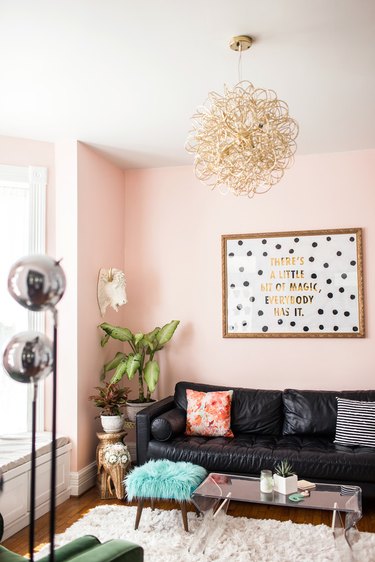 pink living room with black accents