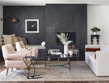 living room with a dried floral arrangement on the coffee table