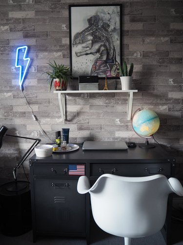 teen boy bedroom with neon sign