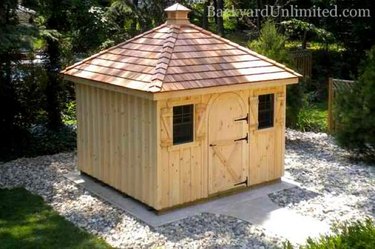 Shed with hipped roof.